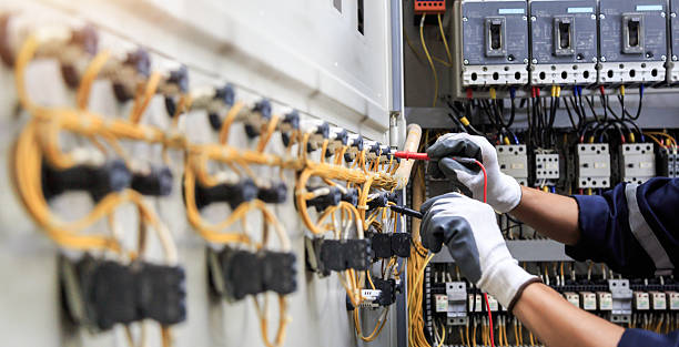 Professional Electrician technician working in River Falls, WI